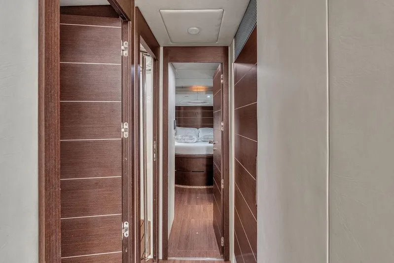  Yacht Photos Pics Hallway inside 2006 Azimut 68S yacht, featuring sleek wooden doors and modern design.