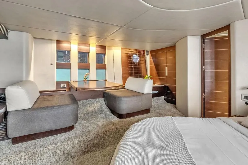  Yacht Photos Pics Luxurious interior of a 2006 Azimut 68S yacht, featuring modern seating and elegant wood finishes.