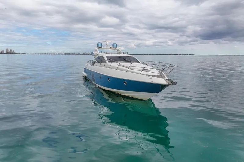  Yacht Photos Pics Azimut 68S 2006 yacht on calm water under cloudy sky.