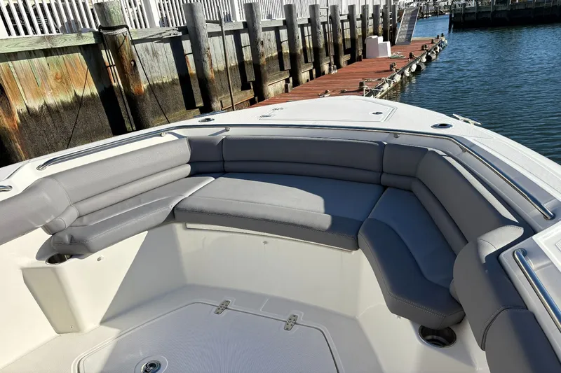  Yacht Photos Pics Boston Whaler 330R 2024, luxurious seating at the dock.