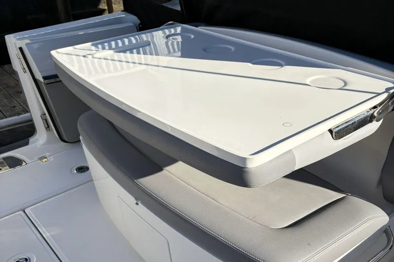  Yacht Photos Pics Boston Whaler 330R 2024 boat seating with table.