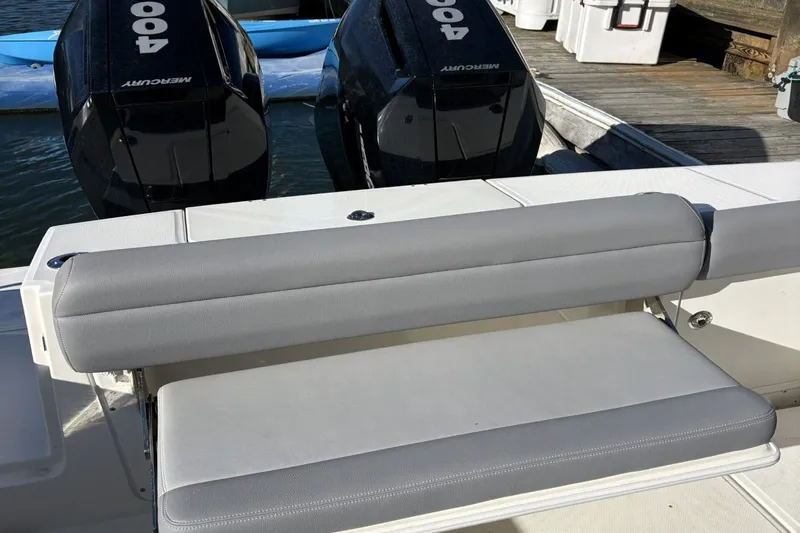  Yacht Photos Pics Boston Whaler 330R 2024 with gray seating and Mercury engines.