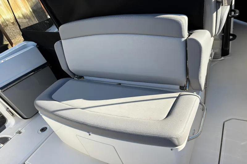  Yacht Photos Pics Boston Whaler 330R 2024 boat seat with gray upholstery.
