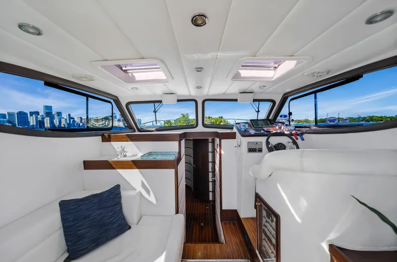 Miss Cathy Yacht Photos Pics Interior of 2007 Custom NNS Sea Scout 41 yacht with city skyline view.