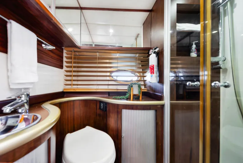 Miss Cathy Yacht Photos Pics Luxurious bathroom interior of 2007 Custom NNS Sea Scout 41 yacht.