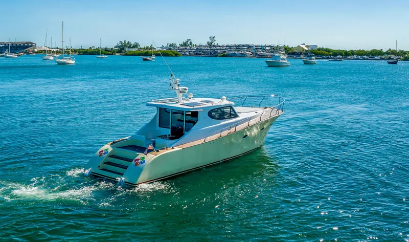 Miss Cathy Yacht Photos Pics Custom NNS Sea Scout 41 yacht cruising in clear blue waters, 2007 model.