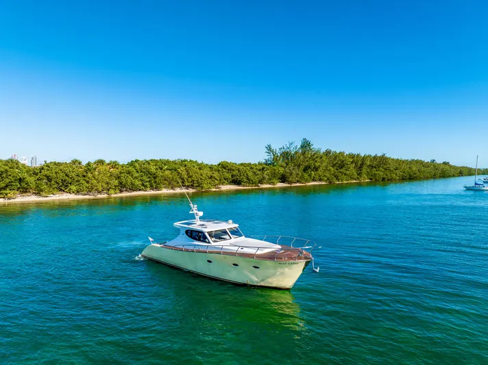 Miss Cathy Yacht Photos Pics Custom NNS Sea Scout 41 yacht cruising on clear blue water, 2007 model.