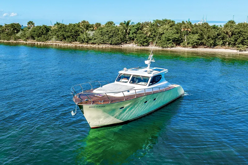Miss Cathy Yacht Photos Pics Custom NNS Sea Scout 41 yacht, 2007 model, cruising on clear blue water.