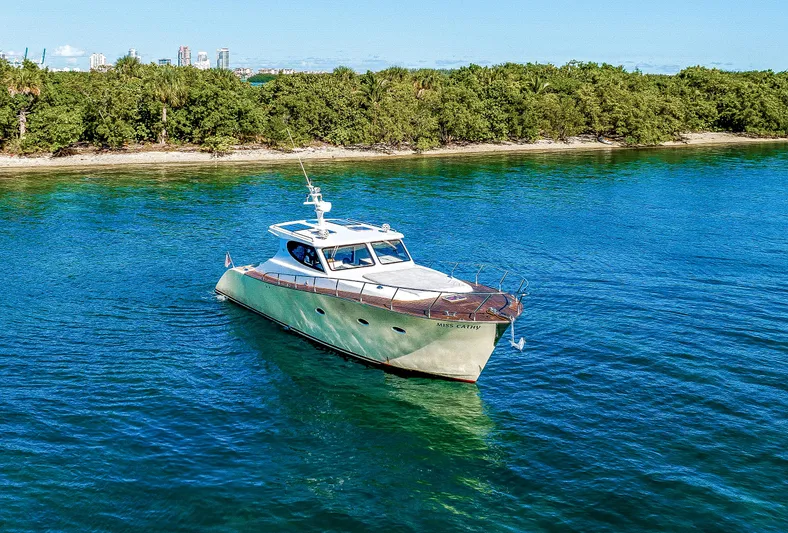 Miss Cathy Yacht Photos Pics Custom NNS Sea Scout 41 yacht cruising on clear blue water, 2007 model.