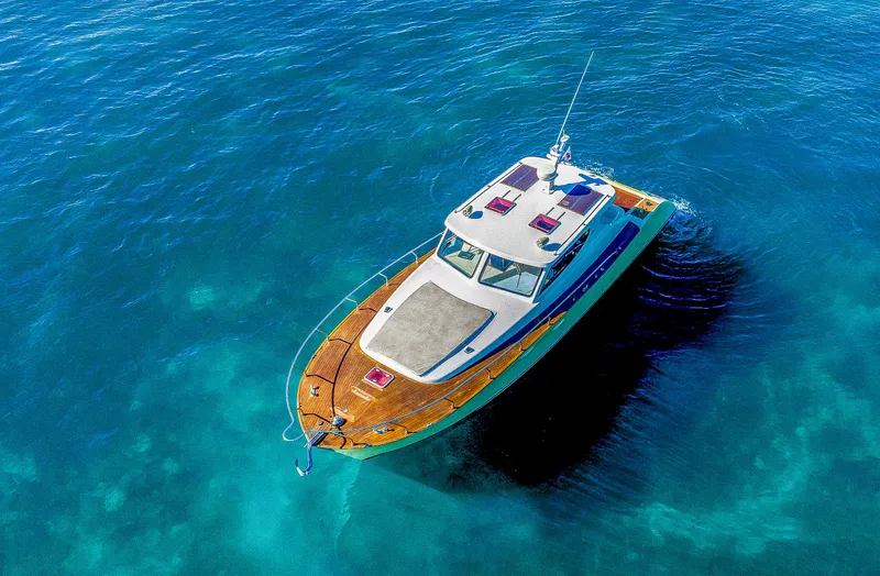 Miss Cathy Yacht Photos Pics Aerial view of 2007 Custom NNS Sea Scout 41 boat on clear blue water.