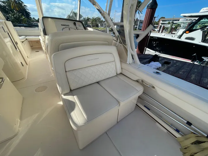  Yacht Photos Pics 2019 Grady-White Freedom 325 boat interior with luxurious seating and elegant design.