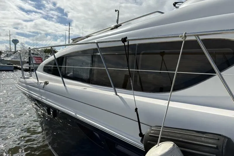 Inconspicuous Yacht Photos Pics 2006 Sea Ray 40 Motor Yacht docked, showcasing sleek design and modern features.