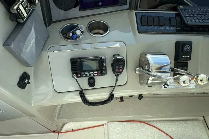 Inconspicuous Yacht Photos Pics Control panel of a 2006 Sea Ray 40 Motor Yacht with radio and throttle.