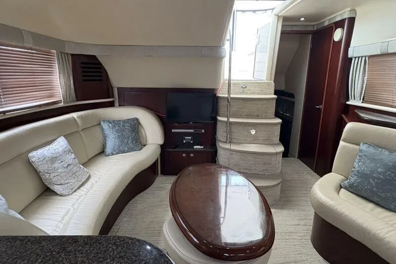 Inconspicuous Yacht Photos Pics Luxurious interior of a 2006 Sea Ray 40 Motor Yacht with elegant seating and modern amenities.