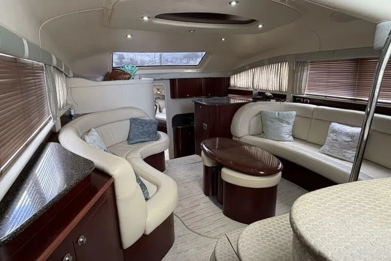 Inconspicuous Yacht Photos Pics Luxurious interior of a 2006 Sea Ray 40 Motor Yacht with elegant seating and modern design.