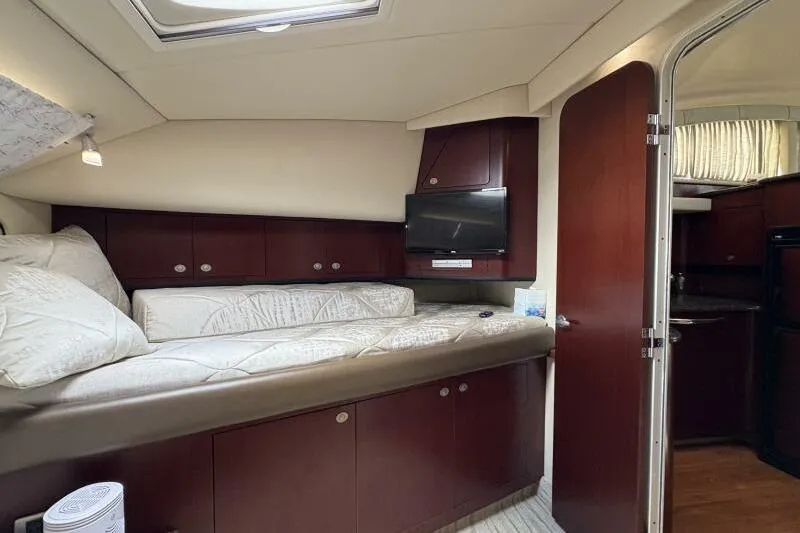 Inconspicuous Yacht Photos Pics Interior of 2006 Sea Ray 40 Motor Yacht with cozy bed and TV.