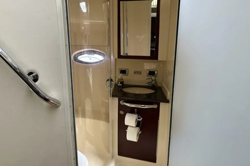 Inconspicuous Yacht Photos Pics Bathroom interior of 2006 Sea Ray 40 Motor Yacht with shower and vanity.