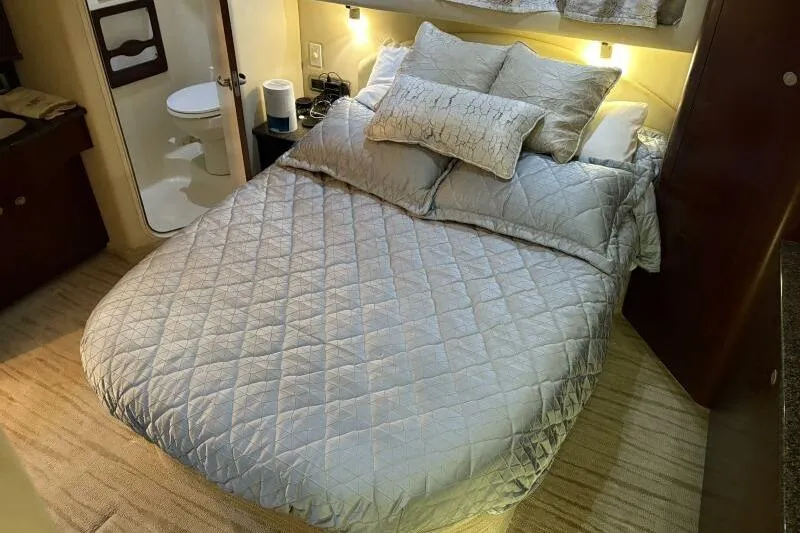 Inconspicuous Yacht Photos Pics Luxurious bedroom interior of 2006 Sea Ray 40 Motor Yacht with cozy bedding.