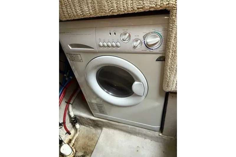 Inconspicuous Yacht Photos Pics Washing machine inside 2006 Sea Ray 40 Motor Yacht, compact and efficient design.