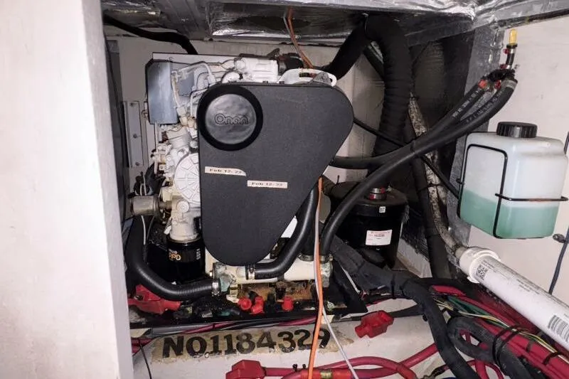 Inconspicuous Yacht Photos Pics Engine compartment of a 2006 Sea Ray 40 Motor Yacht, featuring an Onan generator.