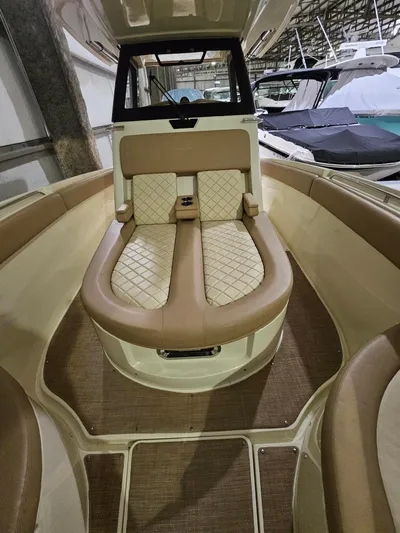  Yacht Photos Pics 2018 Chris-Craft 30 Catalina interior with beige seating and diamond stitching.