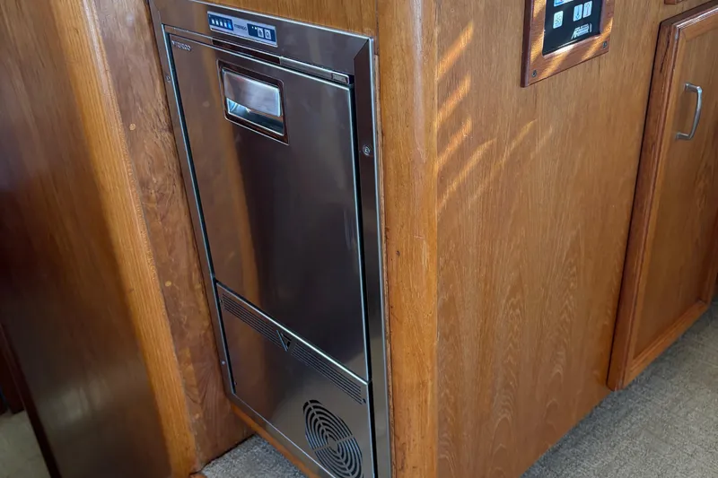 Monkey Business Yacht Photos Pics Stainless steel appliance in 1988 Egg Harbor 37 Convertible yacht interior.