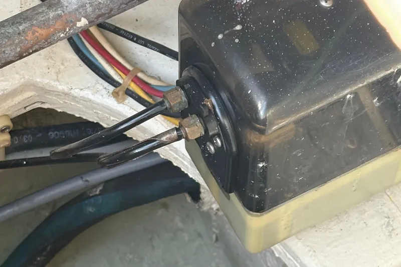 Monkey Business Yacht Photos Pics Electrical component in 1988 Egg Harbor 37 Convertible boat with visible wiring connections.