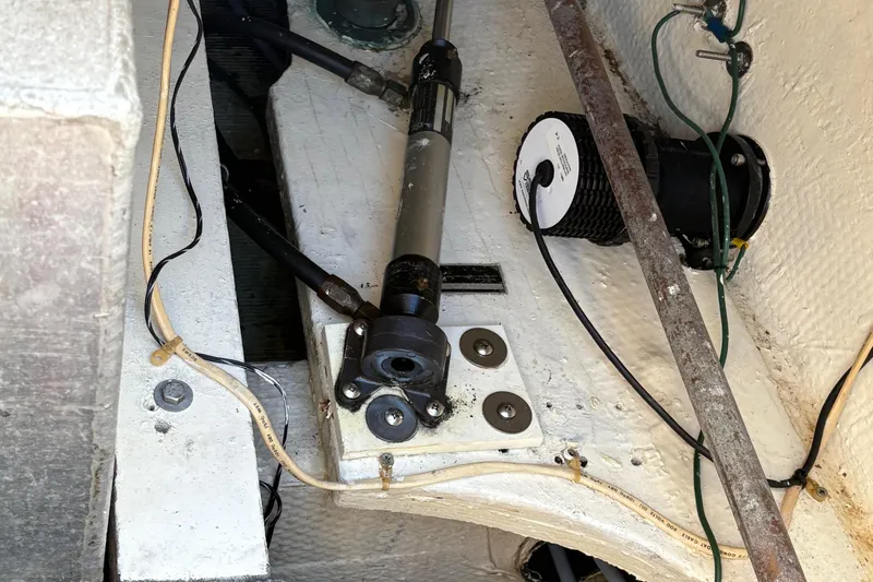 Monkey Business Yacht Photos Pics Engine compartment of 1988 Egg Harbor 37 Convertible boat, showing mechanical components and wiring.