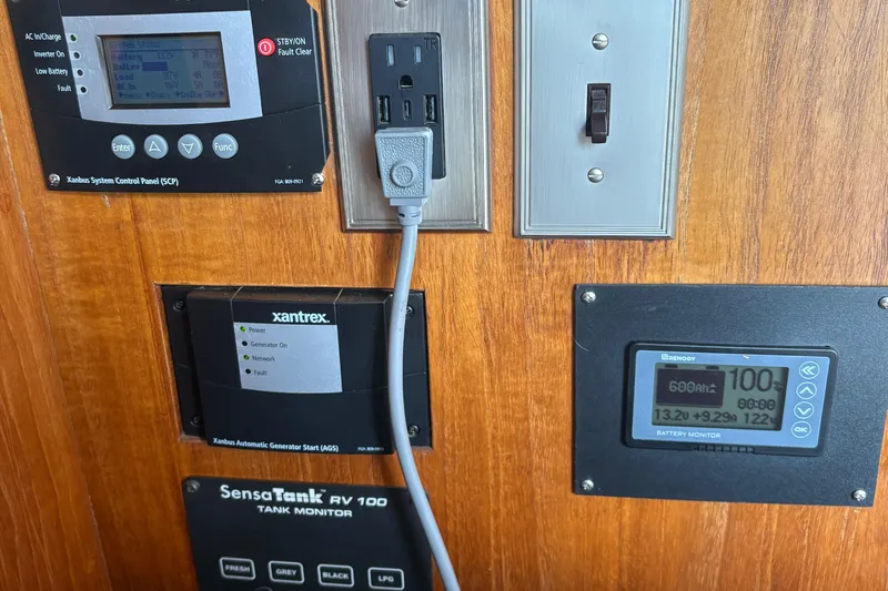 Monkey Business Yacht Photos Pics Control panels and outlets on a 1988 Egg Harbor 37 Convertible boat.