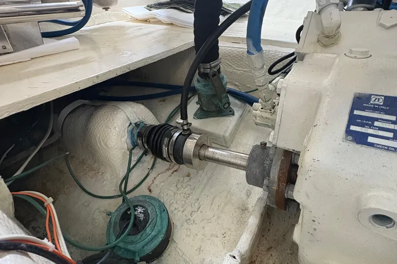 Monkey Business Yacht Photos Pics Engine compartment of 1988 Egg Harbor 37 Convertible boat, showing mechanical components and wiring.