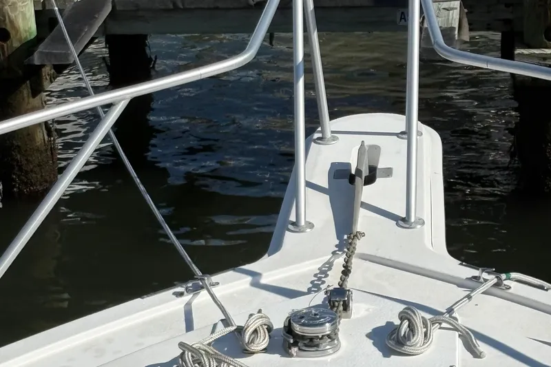 Monkey Business Yacht Photos Pics Bow of 1988 Egg Harbor 37 Convertible boat with anchor and ropes.