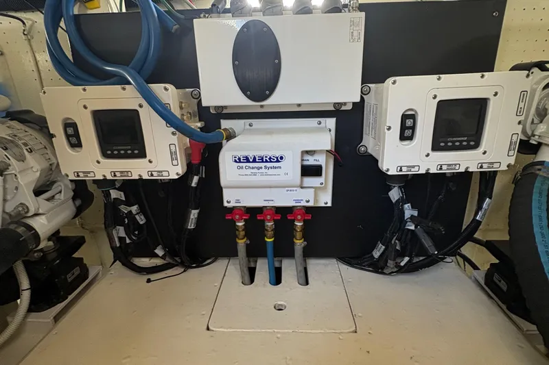 Monkey Business Yacht Photos Pics Engine room of 1988 Egg Harbor 37 Convertible with Reverso oil change system.