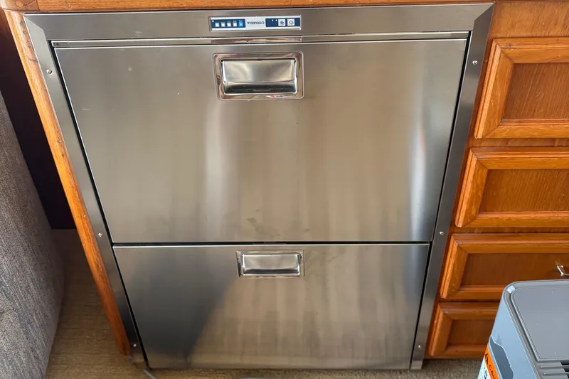 Monkey Business Yacht Photos Pics Stainless steel refrigerator drawers on 1988 Egg Harbor 37 Convertible yacht.