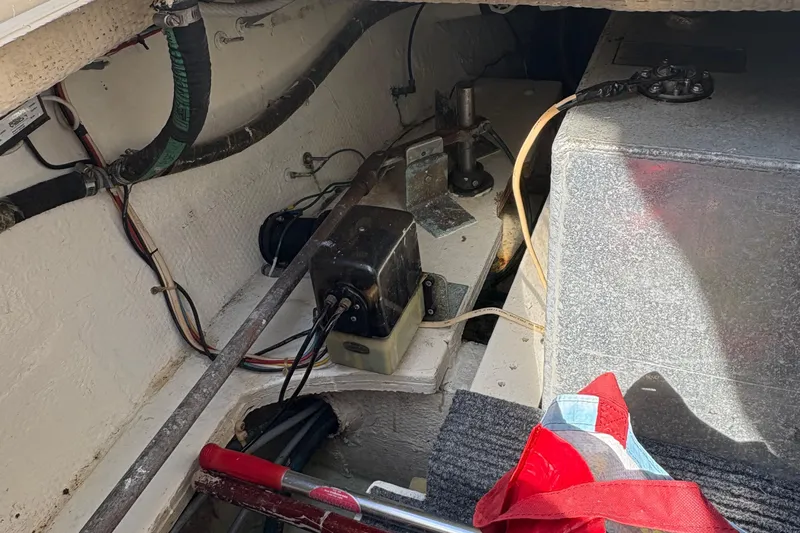 Monkey Business Yacht Photos Pics Engine compartment of a 1988 Egg Harbor 37 Convertible boat, showing wiring and components.