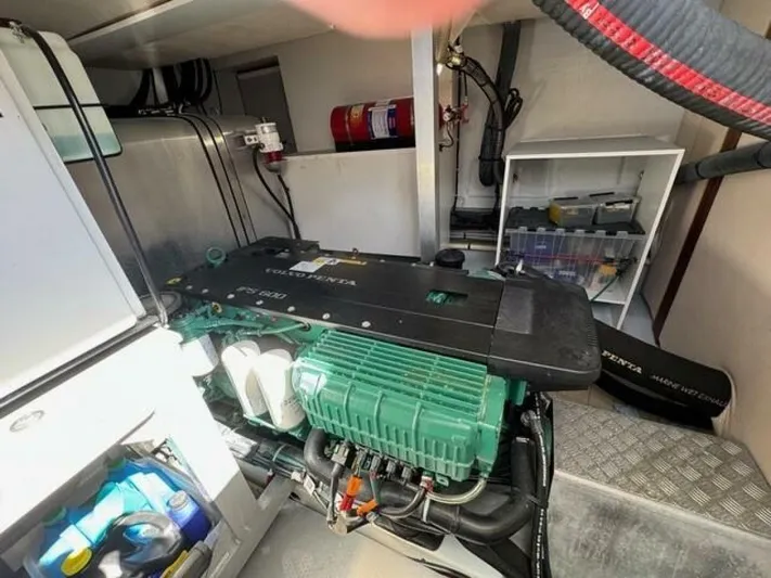 Candy Girl Yacht Photos Pics Engine room of 2017 Beneteau Swift Trawler 50 with visible machinery and storage.