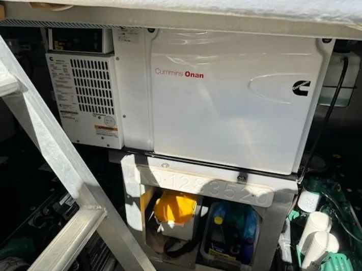 Candy Girl Yacht Photos Pics Engine room of 2017 Beneteau Swift Trawler 50 with Cummins Onan generator.