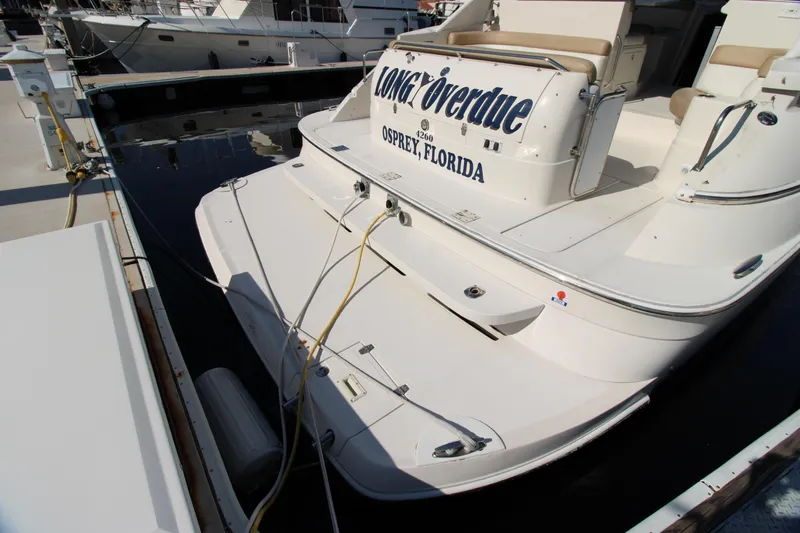 Long Overdue Yacht Photos Pics 2002 Regal Commodore 4260 yacht docked in Osprey, Florida marina.