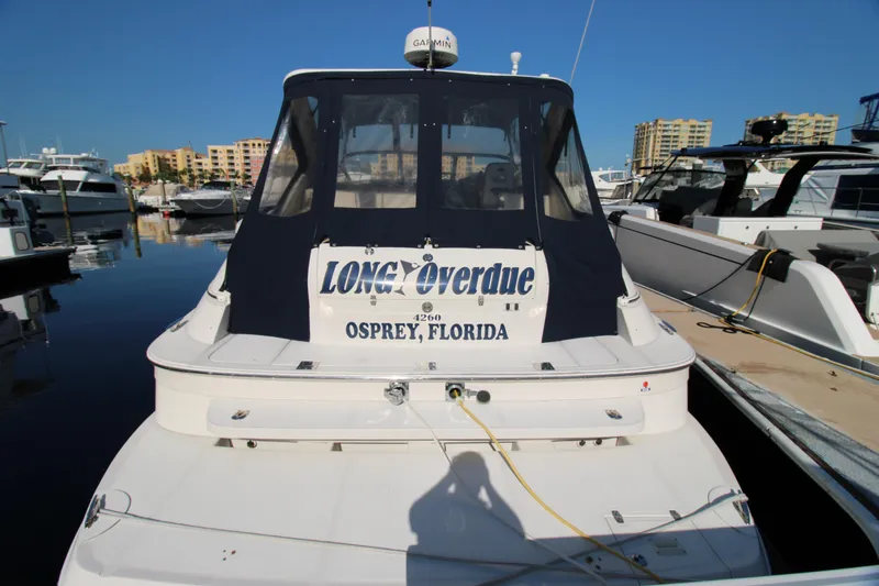 Long Overdue Yacht Photos Pics 2002 Regal Commodore 4260 yacht docked in Osprey, Florida marina.