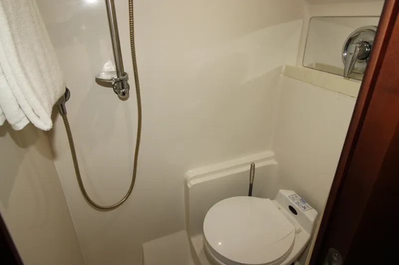 Long Overdue Yacht Photos Pics Bathroom in 2002 Regal Commodore 4260 yacht with shower and toilet.