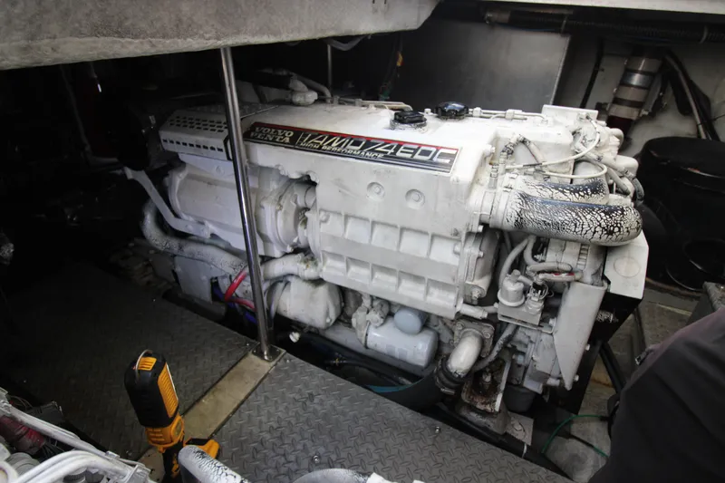 Long Overdue Yacht Photos Pics Engine room of 2002 Regal Commodore 4260 with Volvo Penta engine.