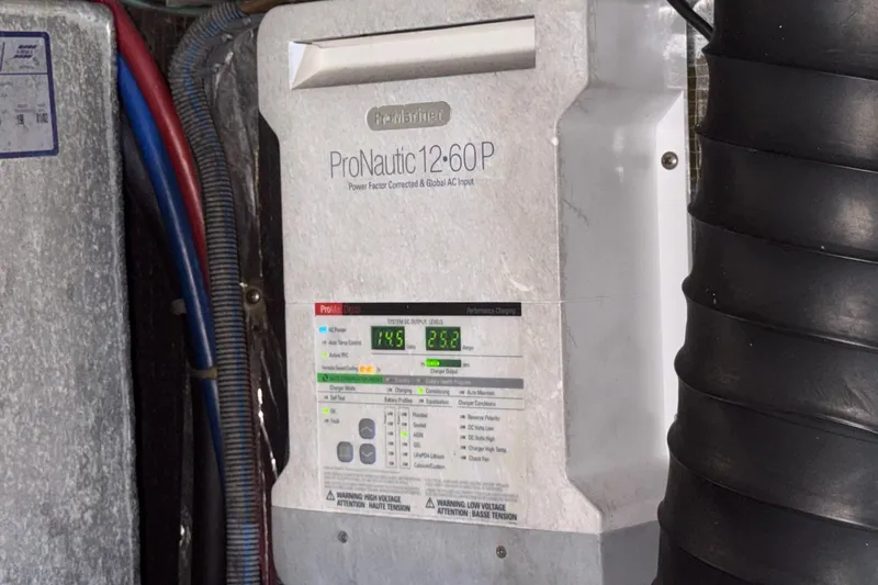 Long Overdue Yacht Photos Pics ProNautic 12:60P charger in 2002 Regal Commodore 4260 boat engine room.