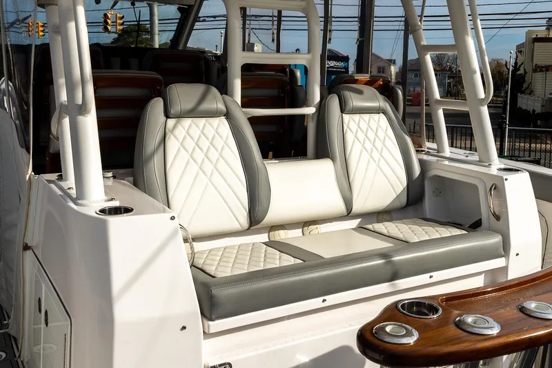 Montrachet Yacht Photos Pics 2023 Everglades 455 Center Console boat with luxurious seating and modern design.