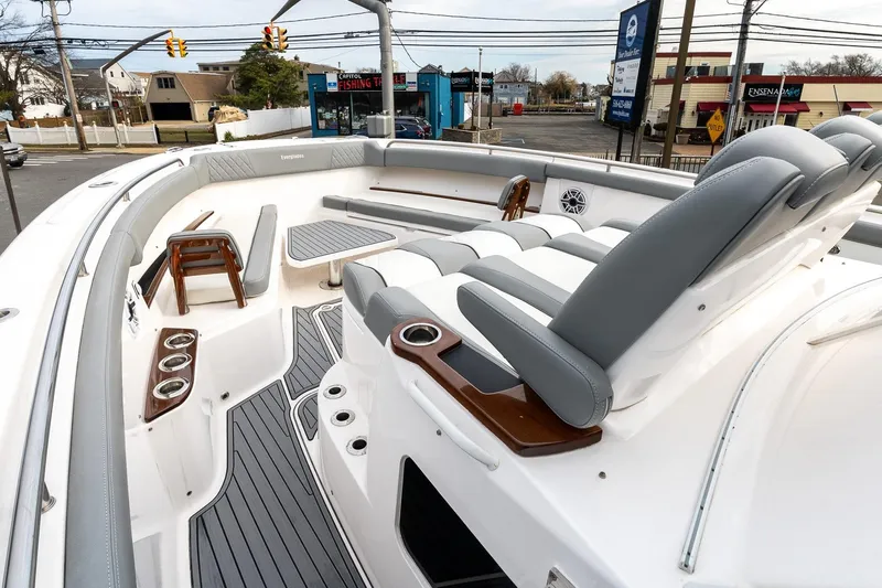 Montrachet Yacht Photos Pics 2023 Everglades 455 Center Console boat interior with seating and cup holders.