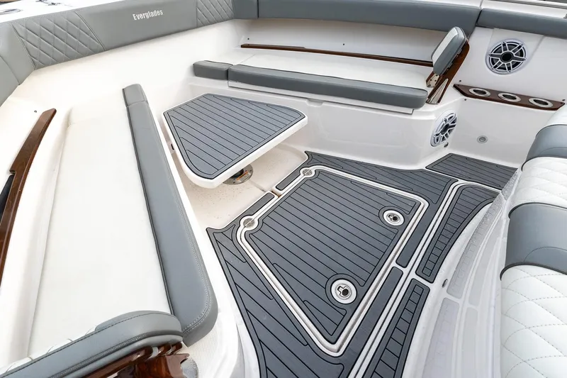 Montrachet Yacht Photos Pics 2023 Everglades 455 Center Console boat interior with cushioned seating and sleek design.