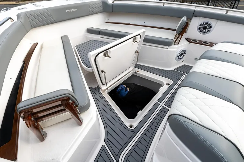 Montrachet Yacht Photos Pics 2023 Everglades 455 Center Console boat interior with open storage compartment.