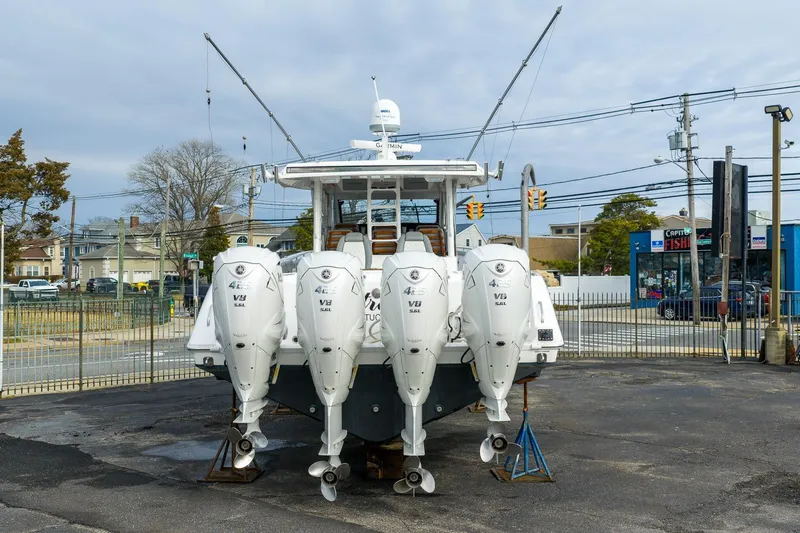Montrachet Yacht Photos Pics 2023 Everglades 455 Center Console boat with four powerful outboard engines.