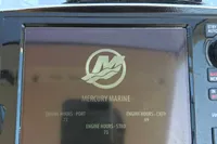 Mercury Marine display on 1996 Maxi Custom Tender, showing engine hours for port and starboard.