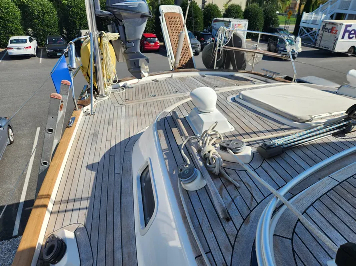 Just Do It Yacht Photos Pics Deck view of 2006 Hallberg-Rassy 53 sailboat with winches and ropes.