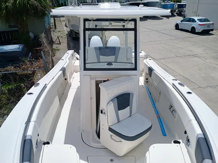 270-152 Yacht Photos Pics 2025 Robalo R270 Center Console boat with sleek seating and modern design.