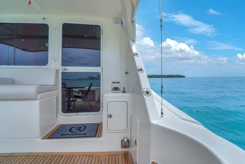  Yacht Photos Pics 2008 Riviera 51 Enclosed Bridge yacht with ocean view and teak deck.